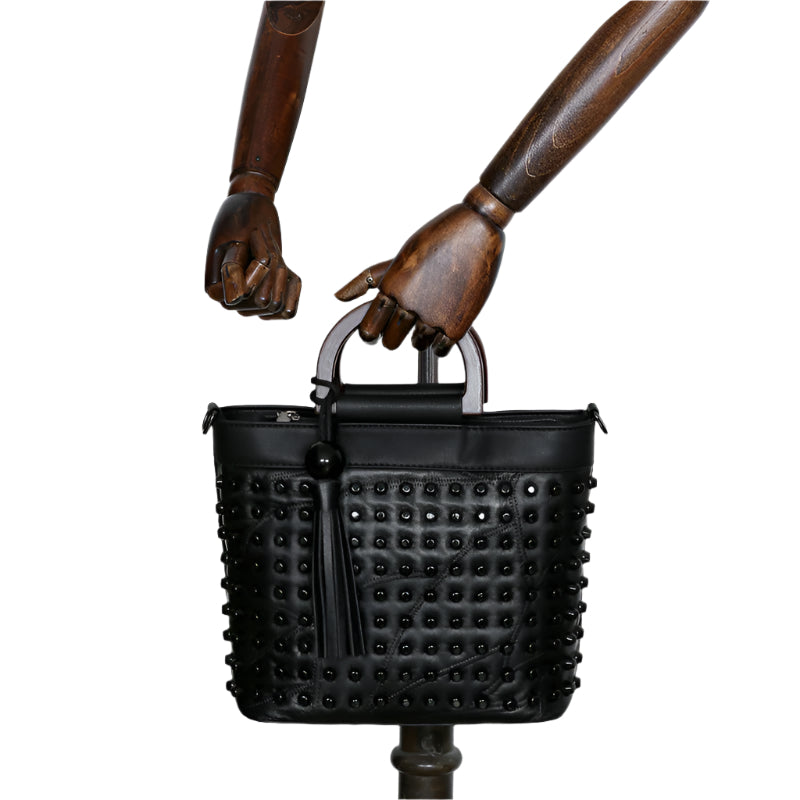 Riveted Sheepskin Tassel Accent Handbag