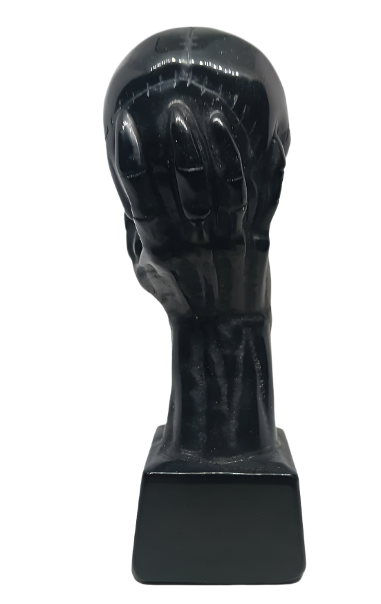 Obsidian Crystal Skull in a Dragon's Hand