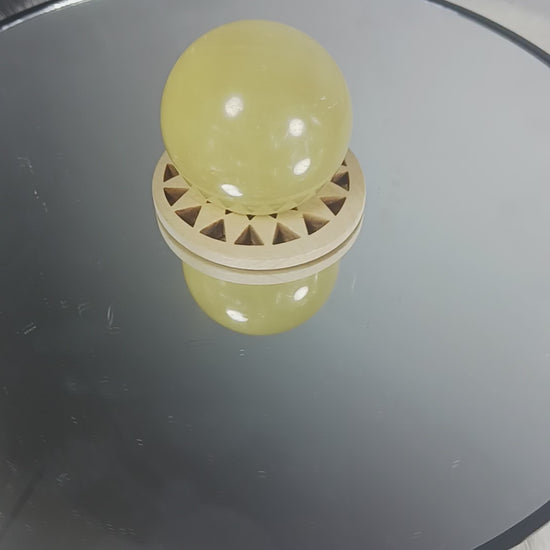 Honey Calcite Crystal Sphere
Norse Magic Store