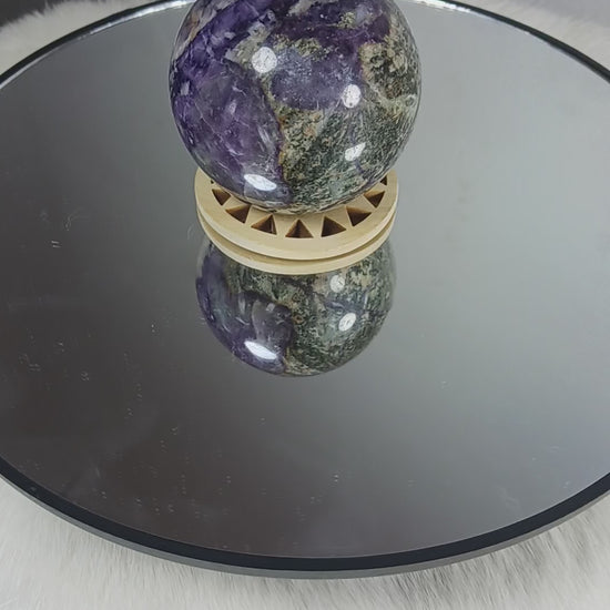 Fluorite Root Crystal Sphere
Norse Magic Store